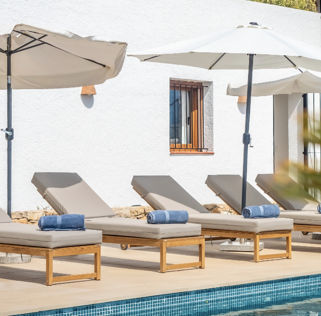 Poolside loungers with mountain views